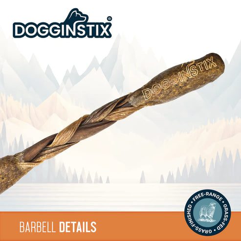 Close-up of a wooden Dogginstix barrel with carved designs.