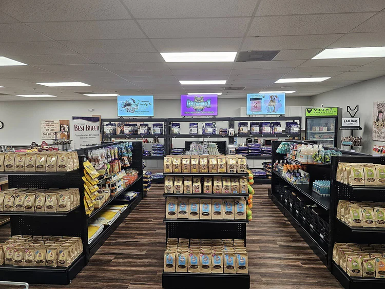 Interior view of a well-organized grocery store aisle with various products.